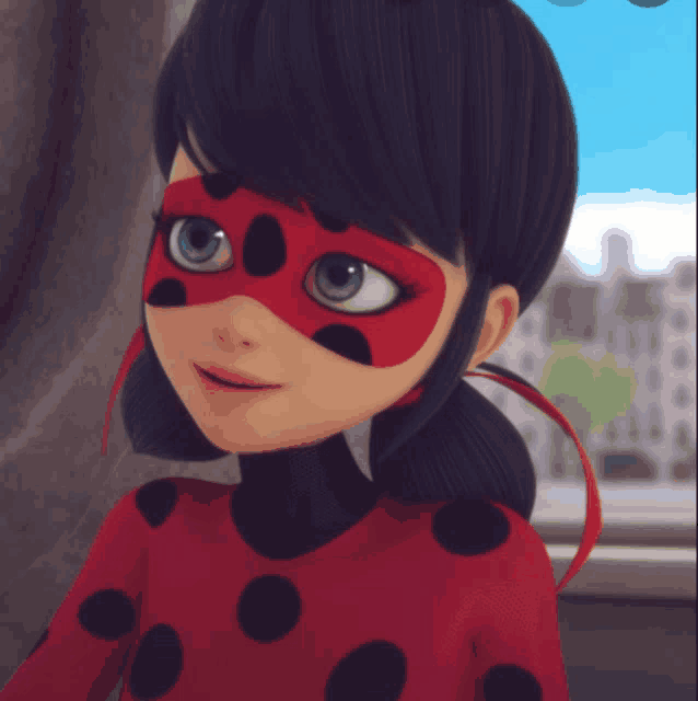 a ladybug cartoon character wearing a red and black costume