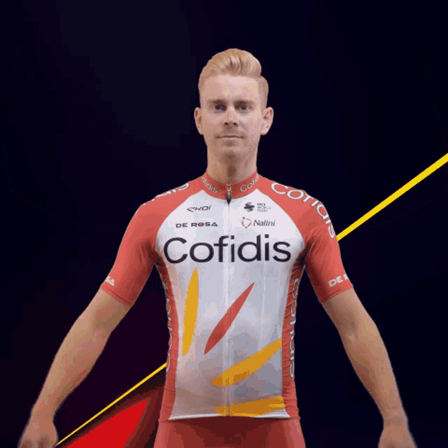 a man in a red and white cofidis jersey