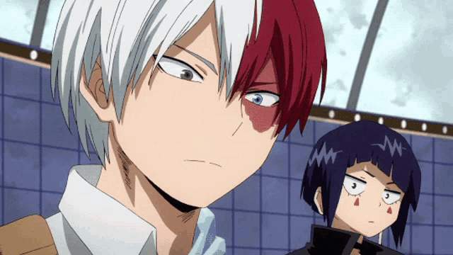 a boy with red and white hair is standing next to a girl with purple hair