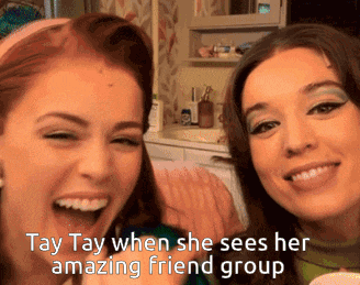 two women are smiling and laughing and the caption says tay tay when she sees her amazing friend group