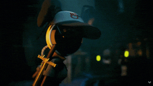 a purple light is shining through a dark background .
