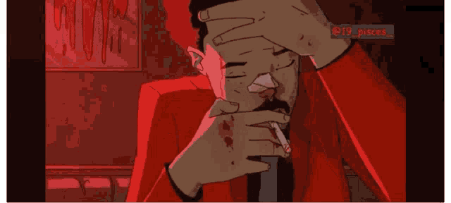 a man in a red suit is smoking a cigarette and holding his head .