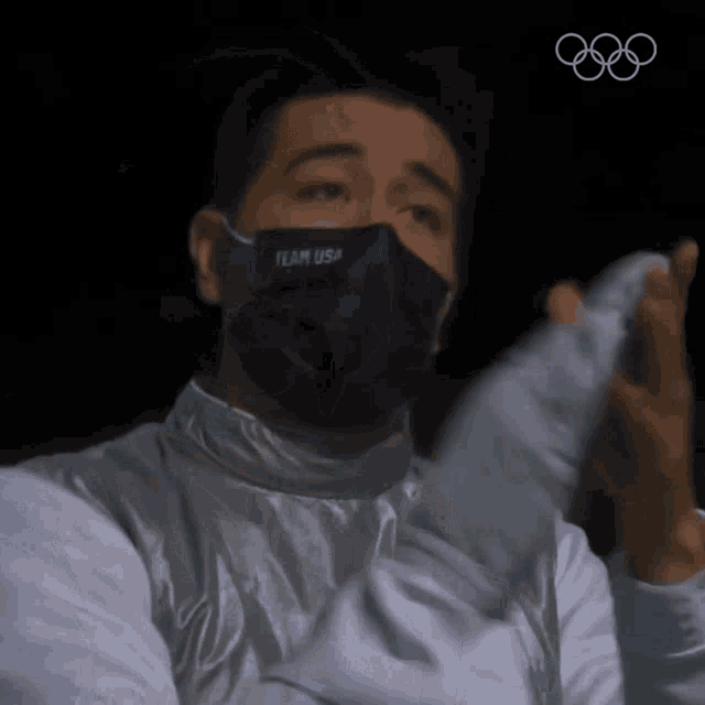 a man wearing a mask with team usa on it