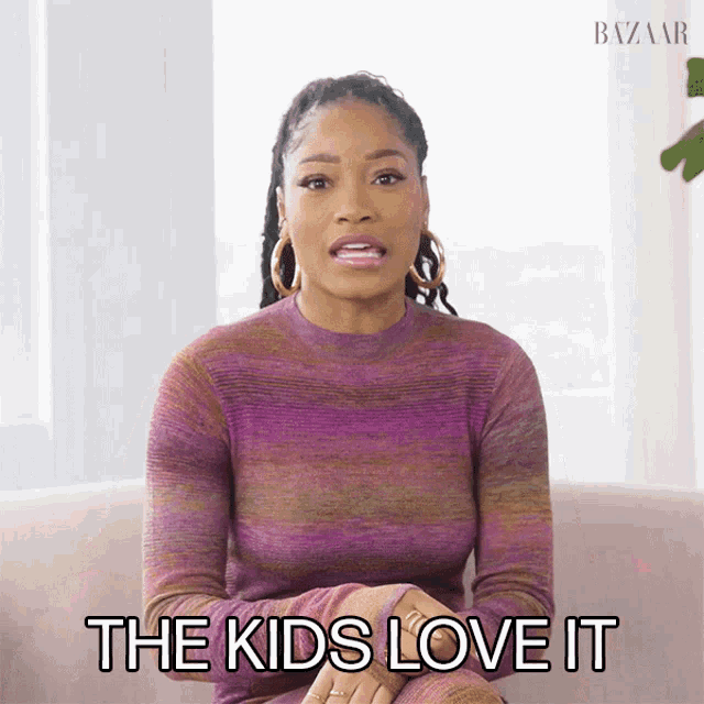 a woman sitting on a couch with the words " the kids love it "