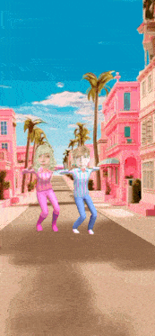 a boy and a girl are dancing in front of a pink building