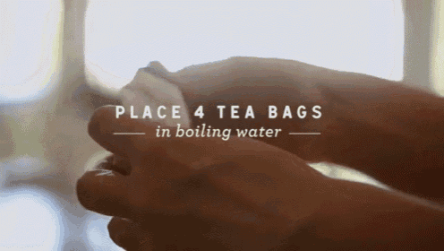 a person is holding a tea bag in their hands with the words place 4 tea bags in boiling water below them