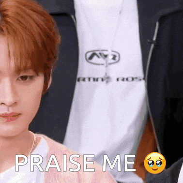 a close up of a person with the words praise me on the bottom