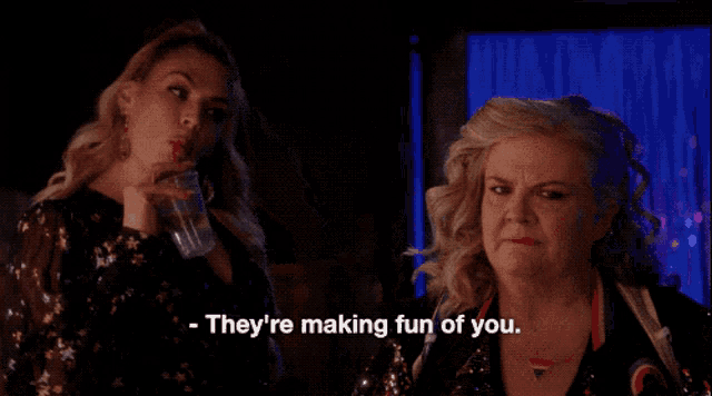 a woman says they 're making fun of you while another woman looks on