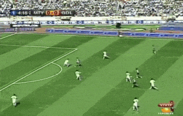 a soccer game is being played in a stadium with advertisements for telcel and gonher
