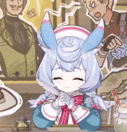 a girl with bunny ears is sitting at a table