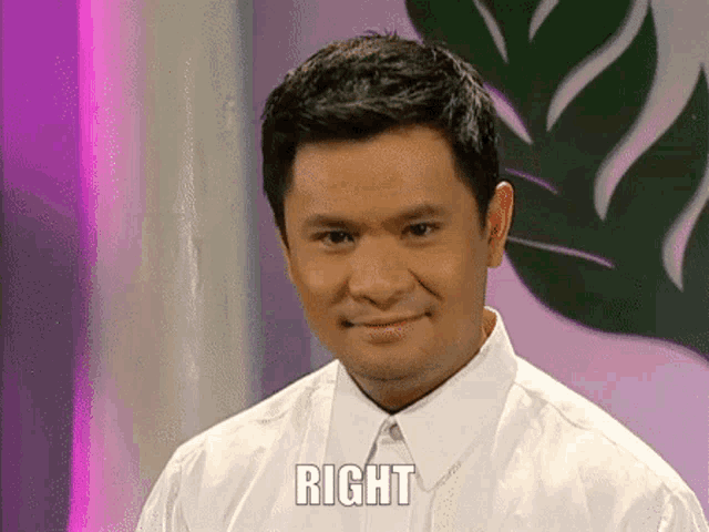 a man in a white shirt with the word right on his shirt
