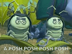 two bugs from the movie a bug 's life are sitting on a leaf together .