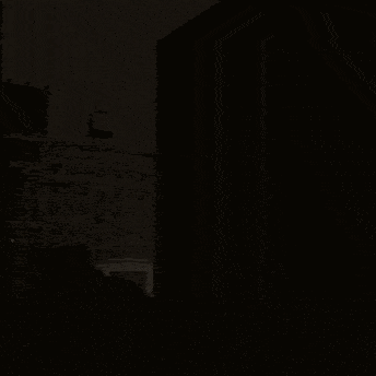 a building with a street light and a sign that says no standing