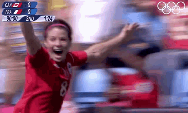 a woman in a red shirt with the number 8 on it