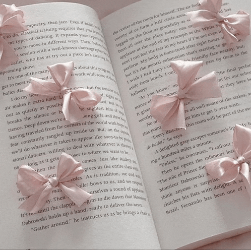 a book is open to a page about ballet