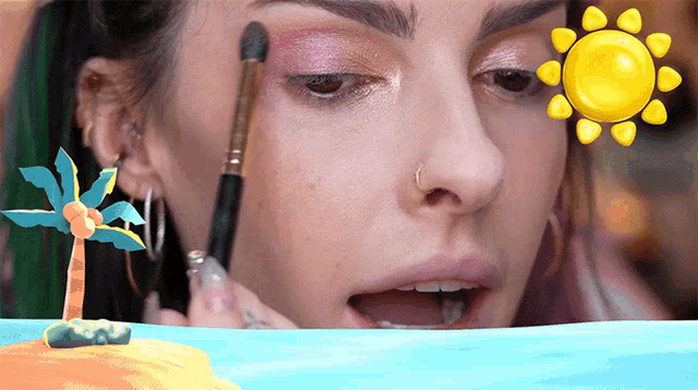 a woman with a nose ring is applying eye shadow
