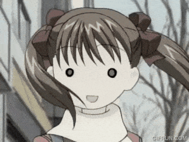 a close up of a girl 's face with a giffun.com watermark on the bottom