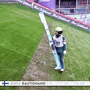 jenny rautionaho is holding a ski in his hands