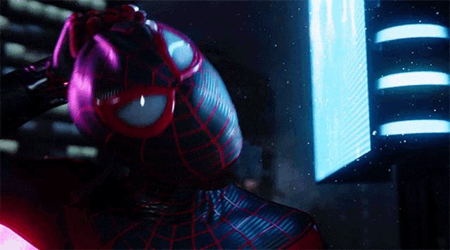 a close up of a person in a spider suit