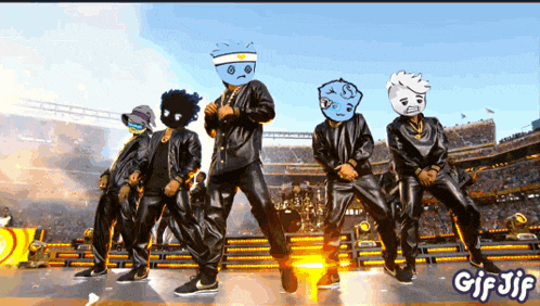 a group of people are dancing on a stage with a gif jif written on the bottom