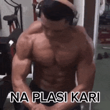 a shirtless man wearing headphones is flexing his muscles with the words na plasi kari below him .