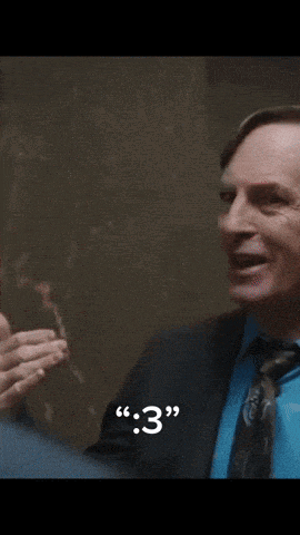 a man in a suit and tie is talking to another man with the number 3 written on the bottom