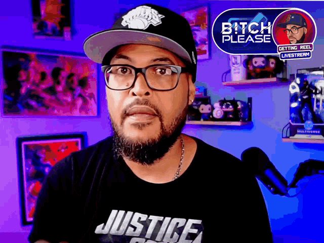 a man wearing a hat and glasses is standing in front of a bitch please sign