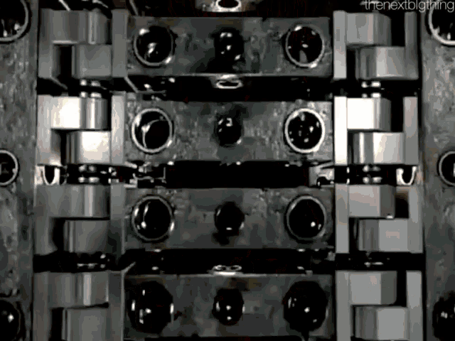 a close up of a mechanical device with the nextbigthing written below it