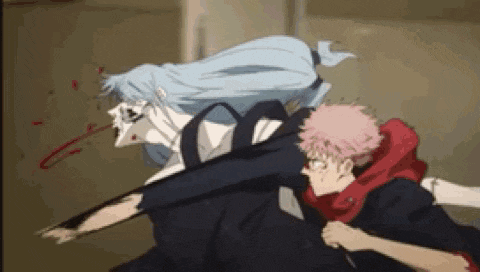 a man and a woman are fighting with a knife in a room .