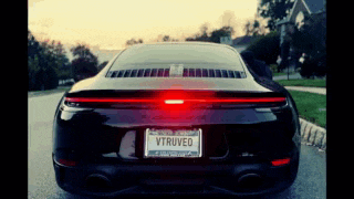 a black car with a license plate that says vtrubed