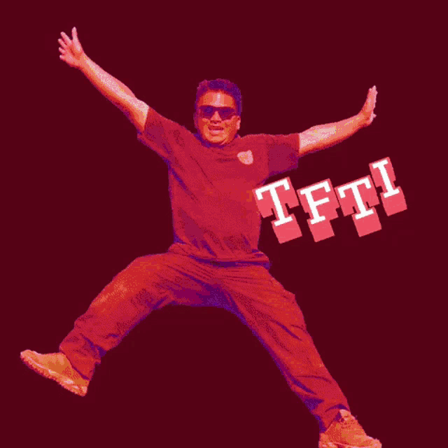 a man in a green shirt is jumping in the air with the word tfti below him