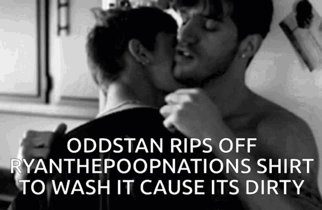 a black and white photo of two men kissing with the caption oddstan rips off