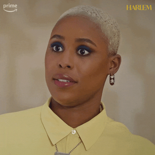 a close up of a woman 's face with the word prime on the bottom