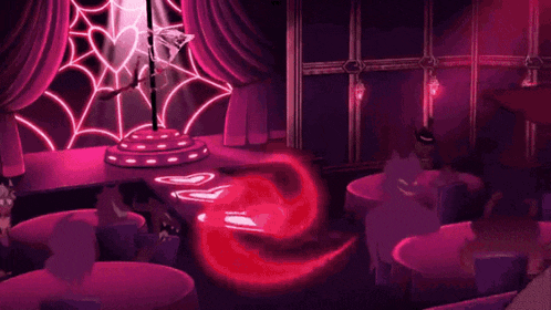 a woman is standing on a pole in a pink room with a spider web on the wall .