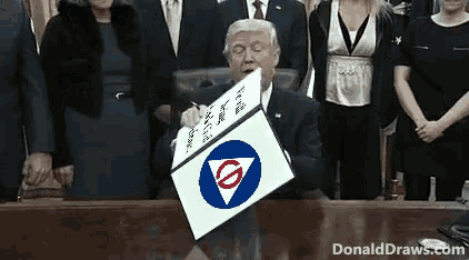 a man in a suit is holding a sign that says donald draws.com in front of him