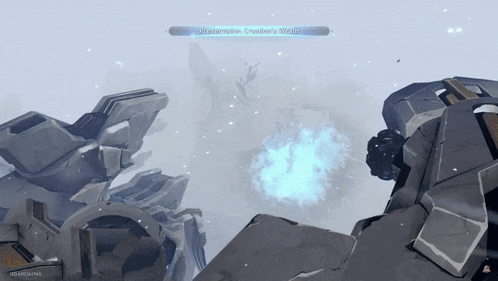 a screenshot of a video game shows a blue glowing object in the middle of a snowy mountain