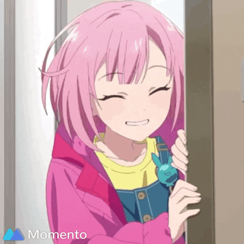 a girl with pink hair is smiling and holding a stuffed animal with the word momento on the bottom