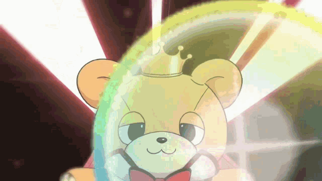 a teddy bear wearing a crown and bow tie