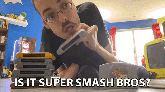 a man playing a video game with the words is it super smash bros above him
