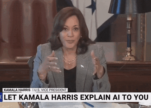 a woman sitting at a desk with the words let kamala harris explain ai to you above her