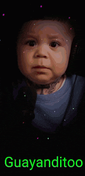 a baby 's face is in a blue cube with the words guayanditoo written on it