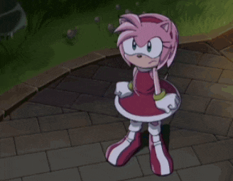 amy rose from sonic the hedgehog is laying on the ground with her arms outstretched