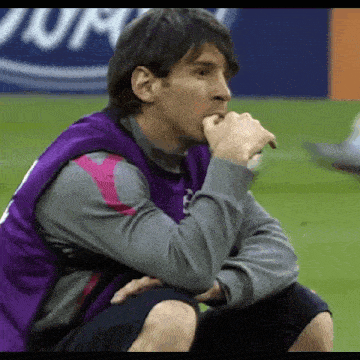 a man in a purple vest with the number 8 on it