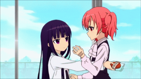 two anime girls are hugging each other and one of them is holding a package that says ' mochi ' on it