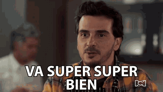 a man says " va super super bien " in spanish