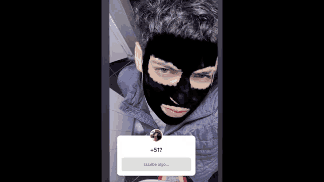 a man with a black mask on his face has a question mark above him that says +51