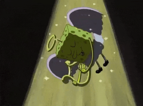 a spongebob squarepants cartoon character is standing on a stage in a dark room .