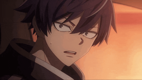 a close up of a person 's face with a surprised look on their face