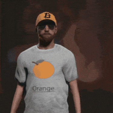 a man wearing a hat with the letter b on it
