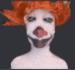 a close up of a person 's face with a red wig on .